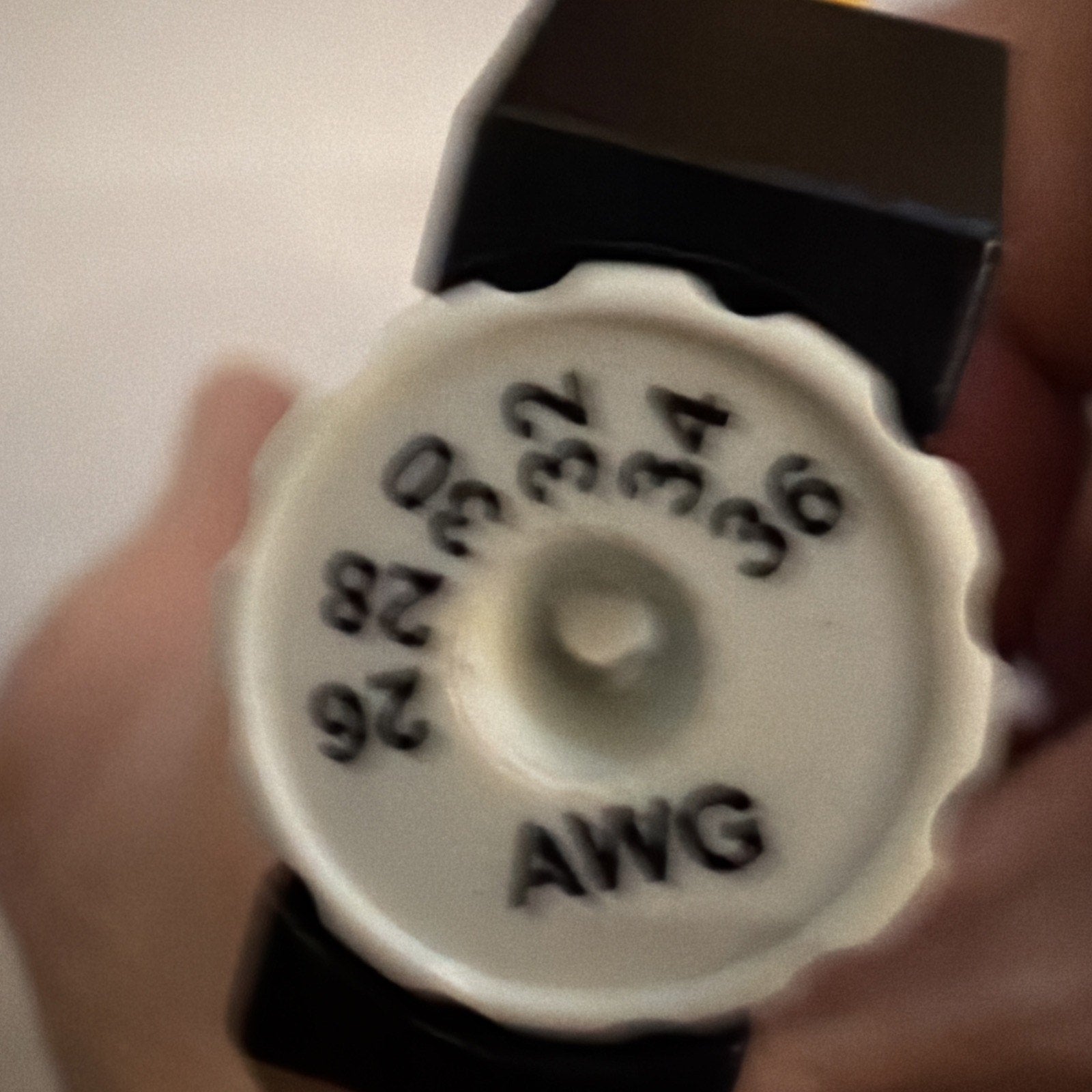 Close-up of JONARD TOOLS ST-450 wire stripper dial showing adjustable AWG sizes from 20 to 36 gauge