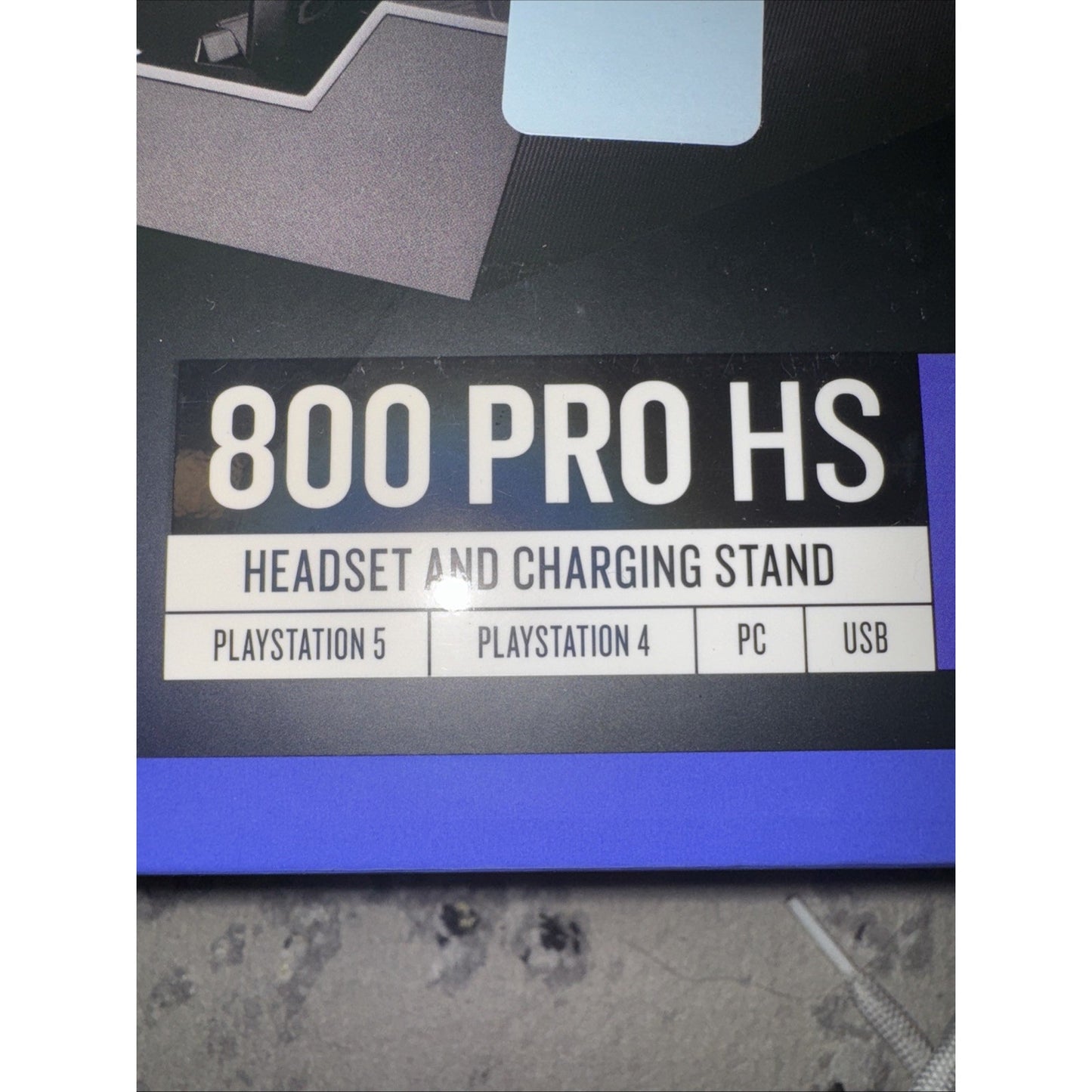 RIG 800 Pro HS Wireless Gaming Headset and charging stand compatible with PS5, PS4, PC, and USB connection in black