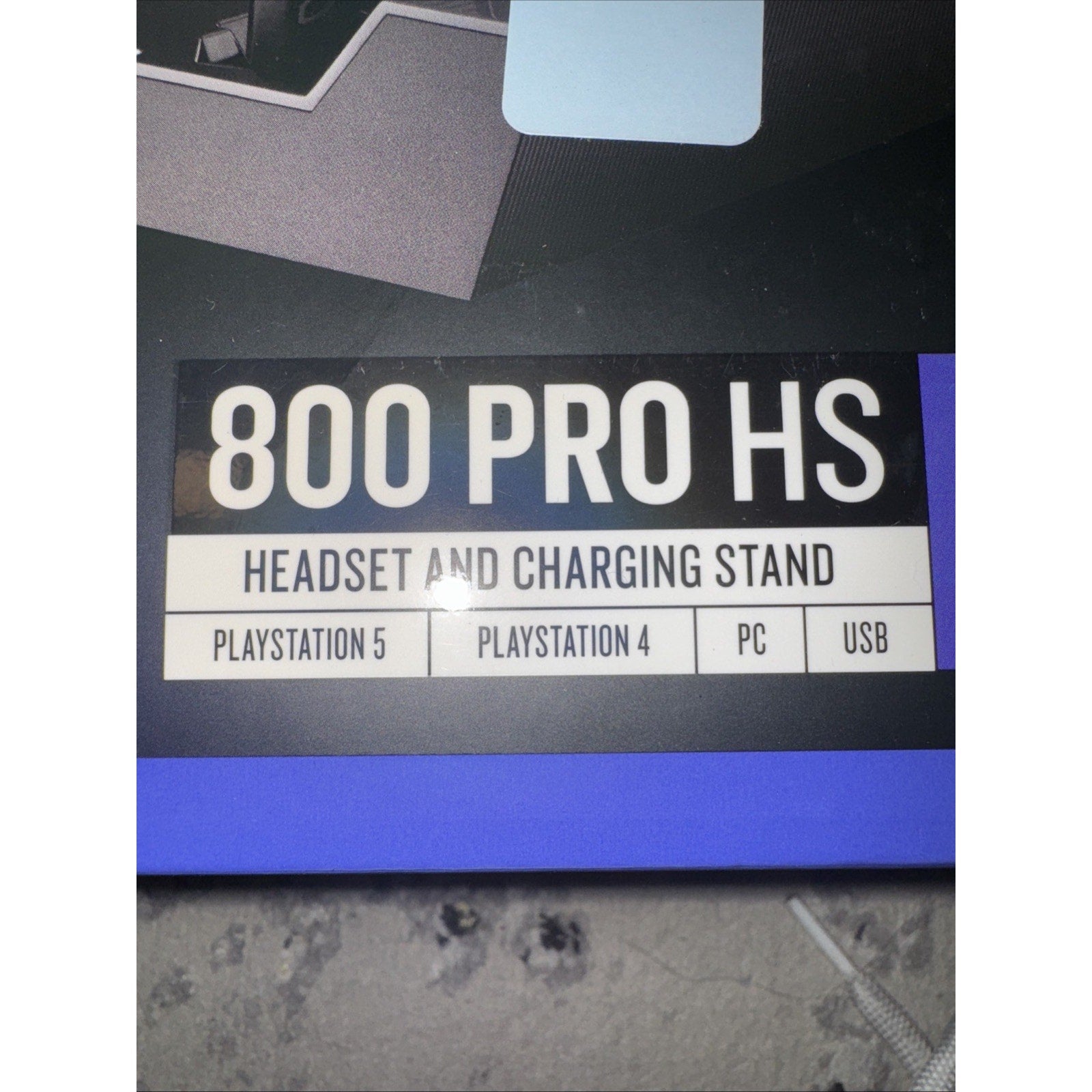 RIG 800 Pro HS Wireless Gaming Headset and charging stand compatible with PS5, PS4, PC, and USB connection in black