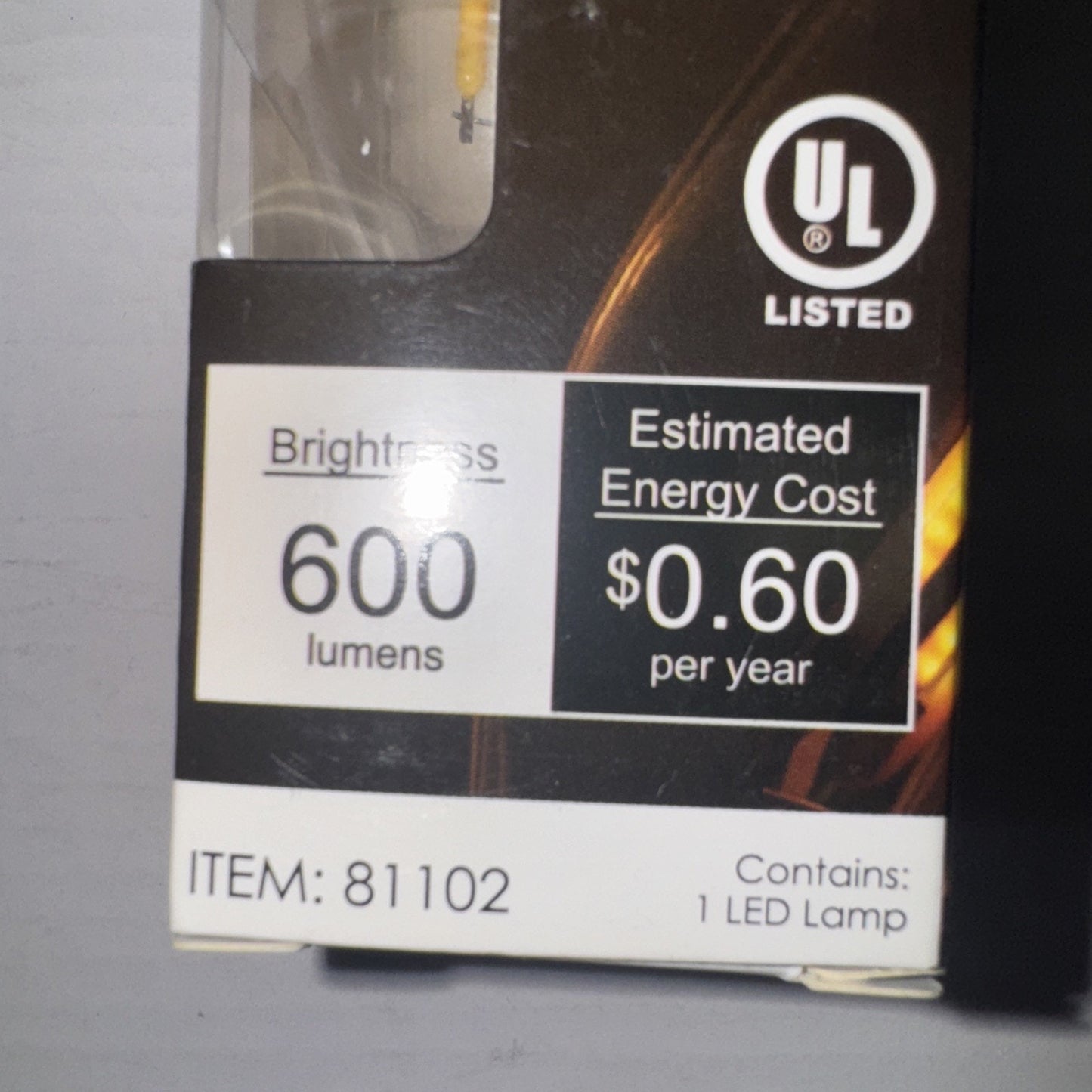 Sunlite LED Bulb 5 watts 600 lumens warm white light with estimated energy cost of 60 cents per year packaging label
