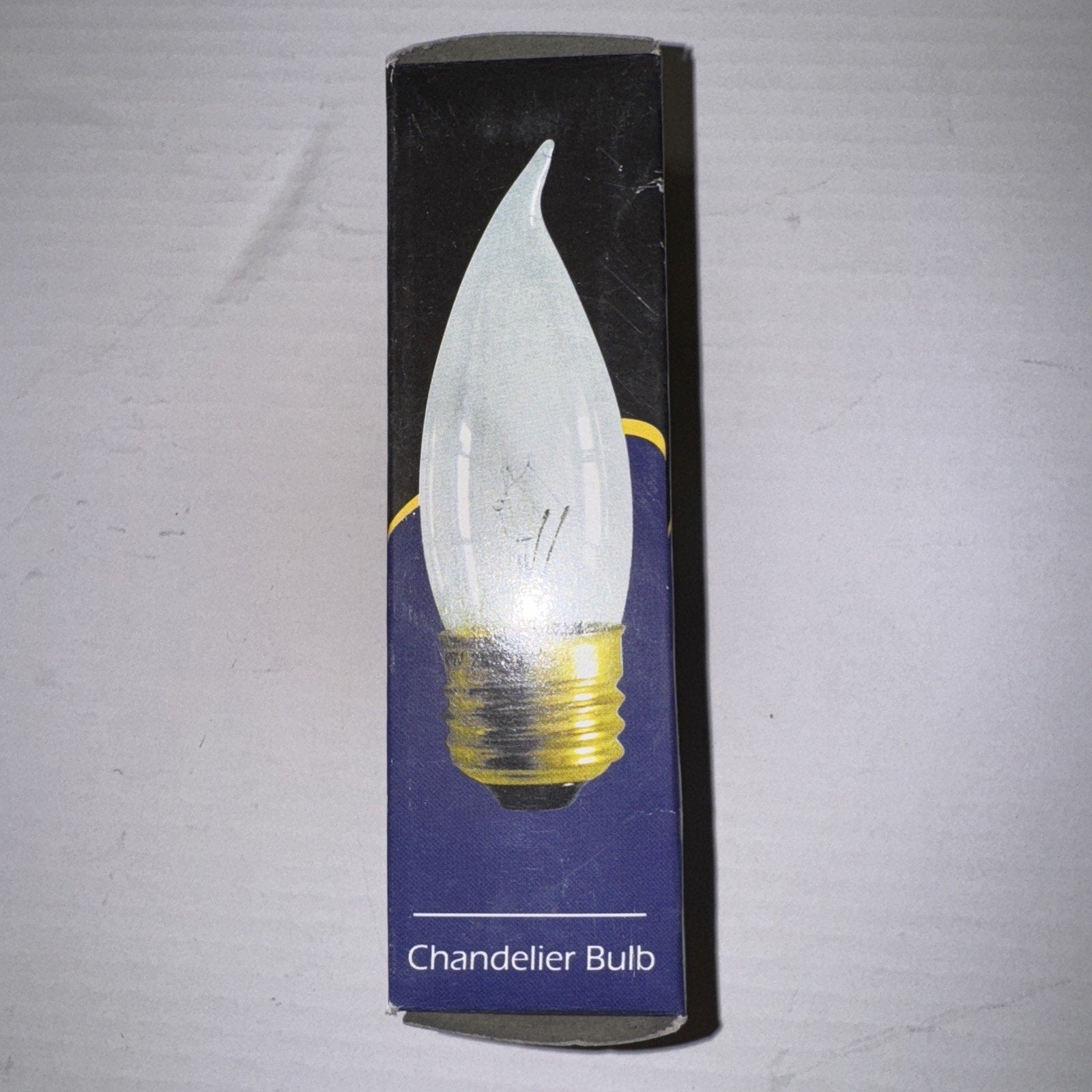 SUNLITE 40w flame-shaped clear candelabra base light bulb packaging with blue and black background text chandelier bulb