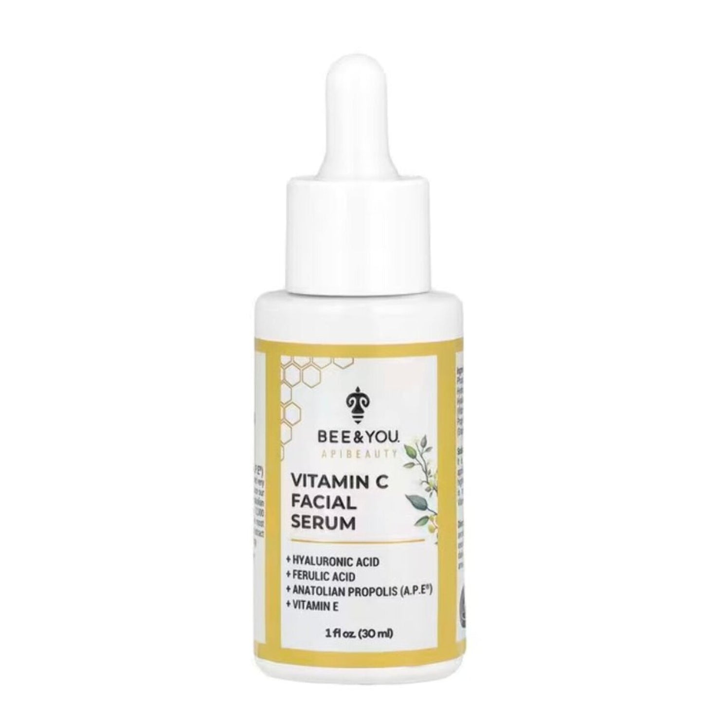 White dropper bottle of Bee & You Apibeauty Vitamin C Facial Serum with yellow-bordered label featuring key ingredients hyaluronic acid, ferulic acid, Anatolian propolis, and vitamin E.