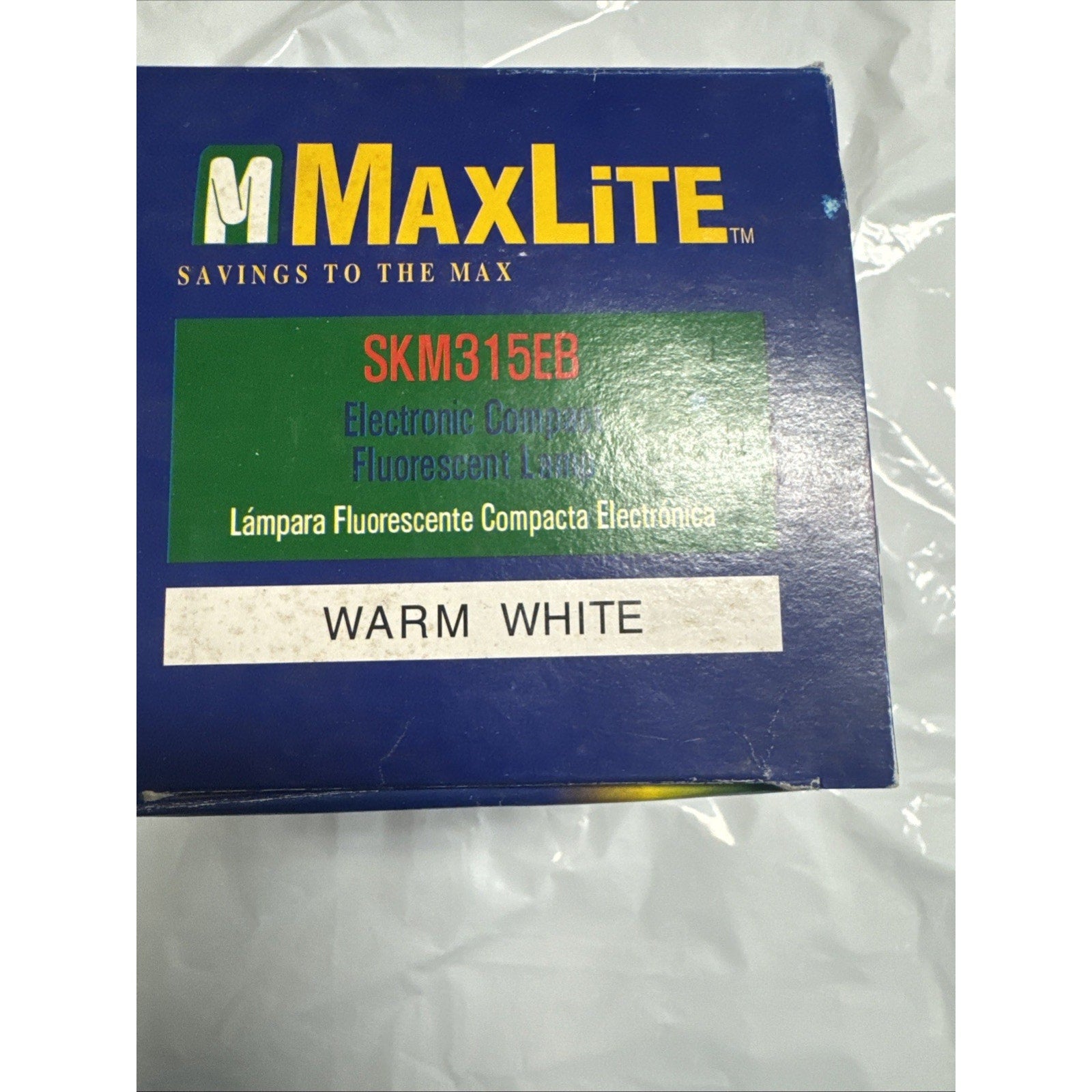 MaxLite SKM315EB electronic compact fluorescent lamp box labeled warm white with blue and green design
