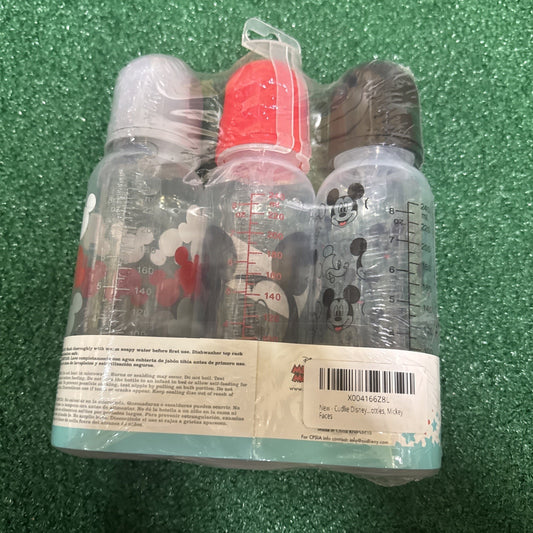 Three-pack of Disney Mickey Mouse 9 oz baby bottles with colorful caps and measurement markings sealed in plastic packaging