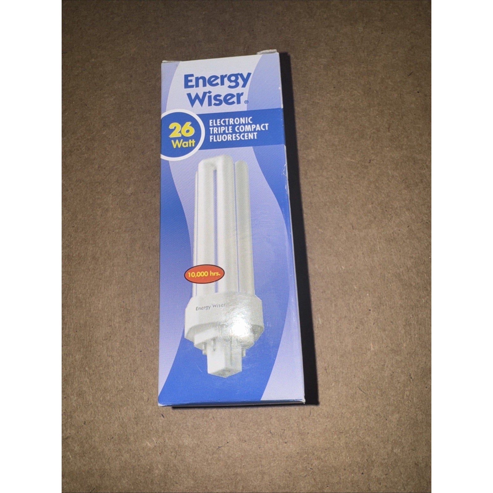 Energy Wiser 26 watt electronic triple compact fluorescent light bulb with 10,000 hour lifespan on box front