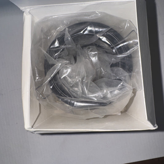 Futura Lighting MR16low 1705-01 recessed downlight body in plastic wrap inside white packaging box viewed from top