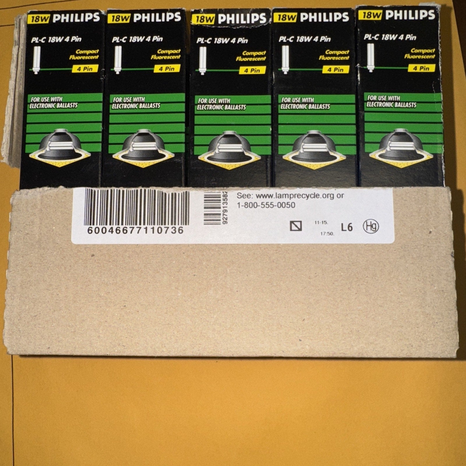 Philips 383307 PL-C 18W 4 Pin compact fluorescent lamp bulbs in packaging box with barcode and recycling info