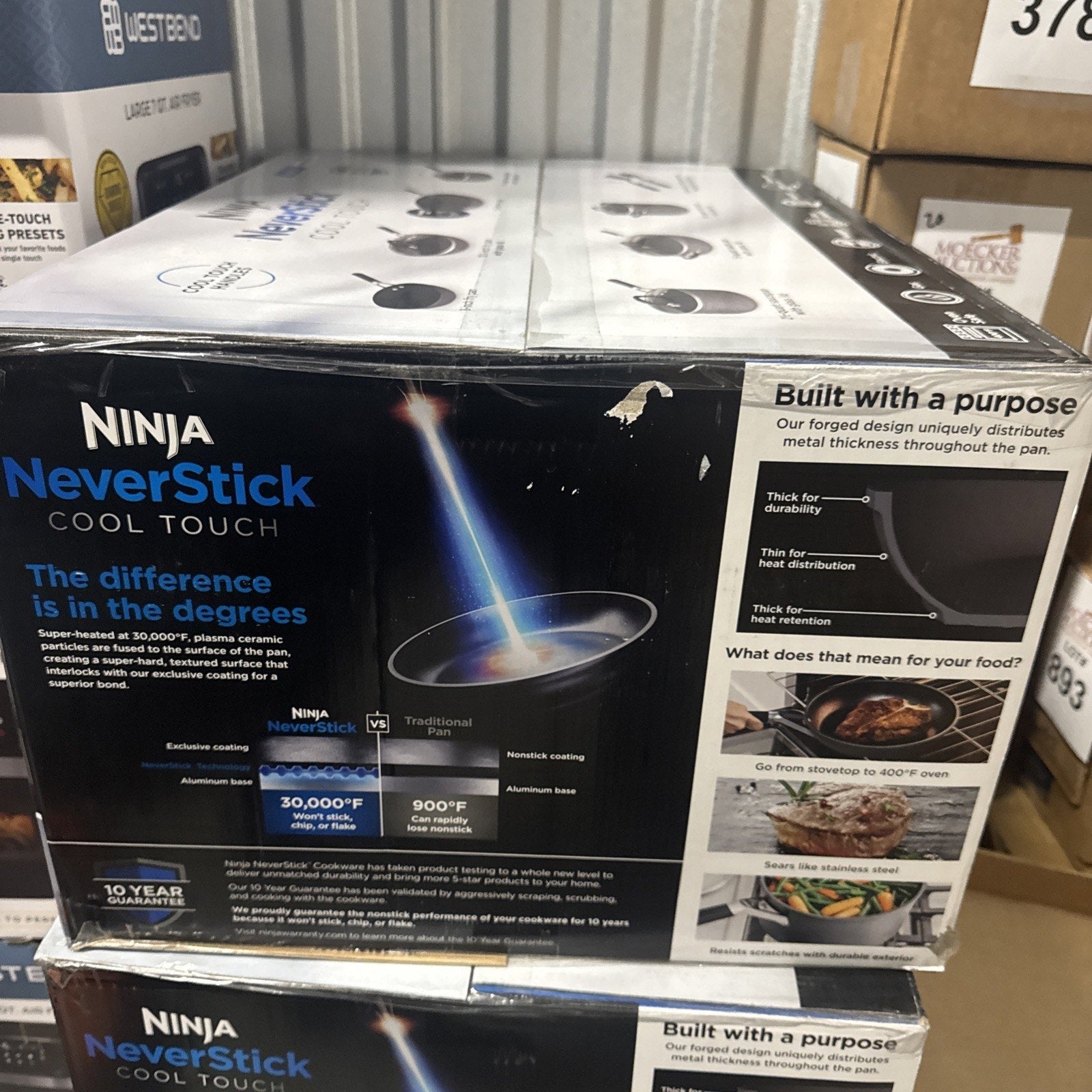 Ninja NeverStick Premium Cool Touch 14 Piece Cookware Set box showing nonstick coating and built to distribute heat evenly