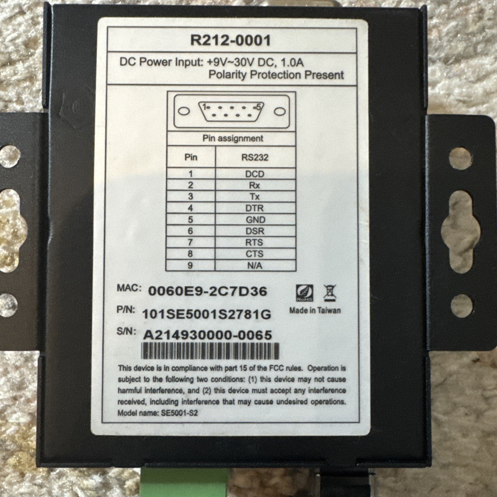 Revel System Serial Server R212-0001 black wiring box with pin assignment, serial and power input details label