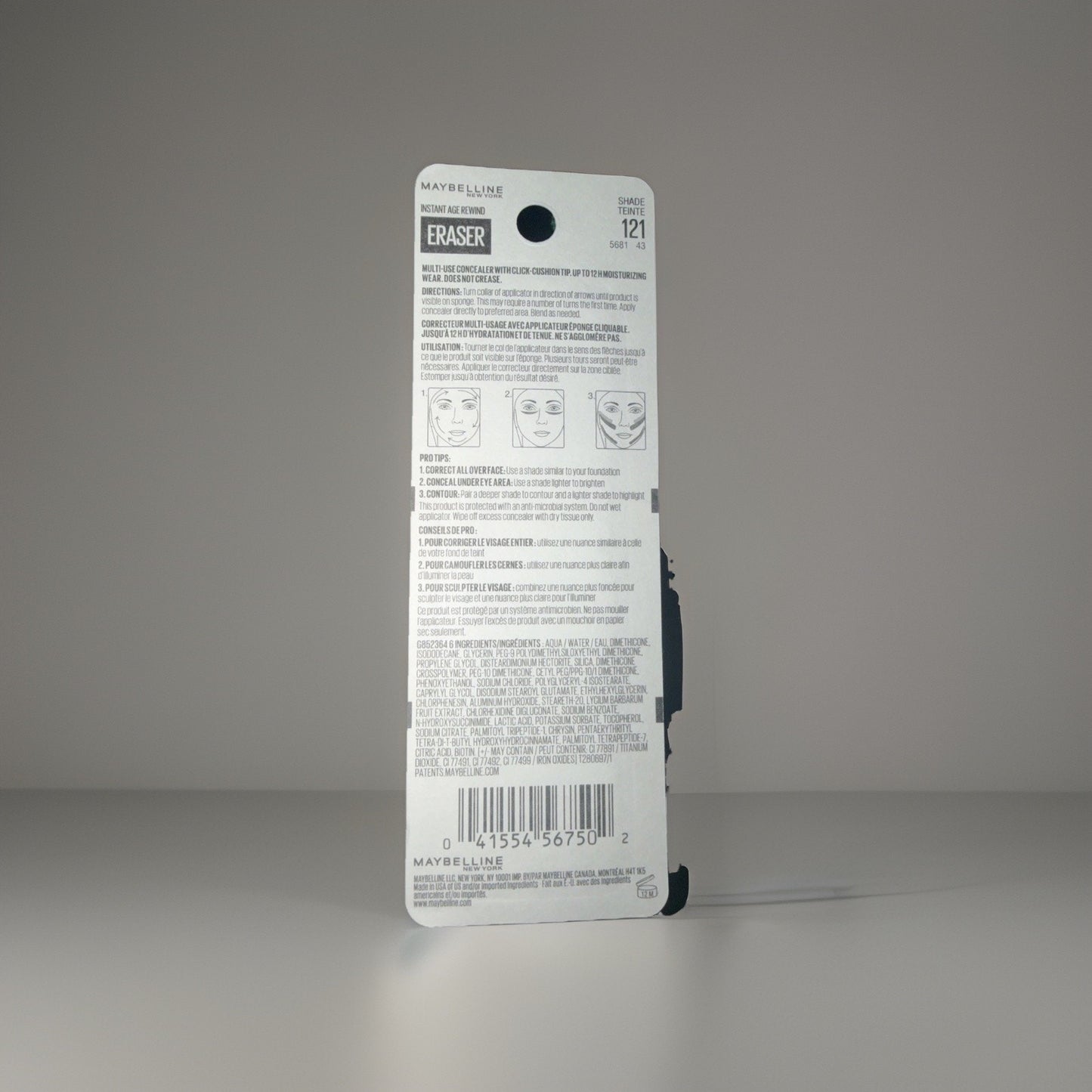 Back of a Maybelline Eraser product package in shade 121, displaying instructions, usage illustrations, ingredient list, and a barcode on a white background.