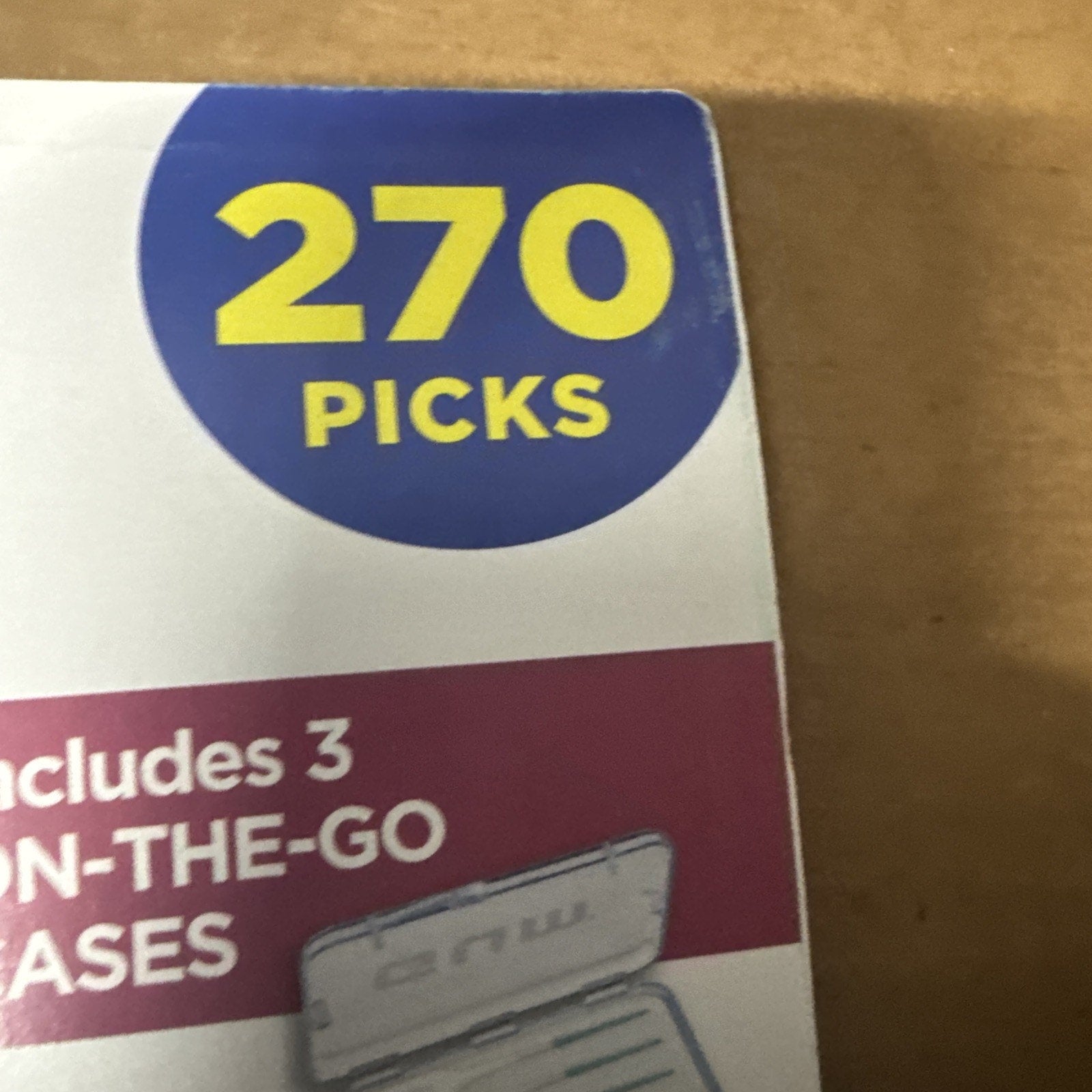 Close-up of Sunstar GUM Soft-Picks packaging showing 270 picks count and part of on-the-go cases text
