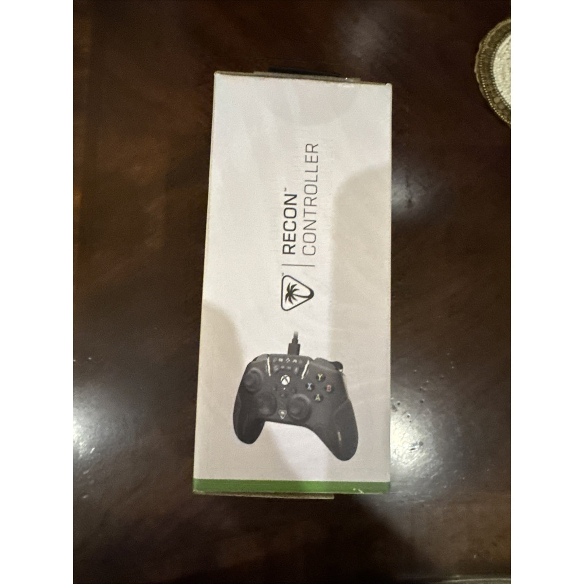 Turtle Beach Recon black wired gaming controller for Xbox Series X and S shown on white packaging box top
