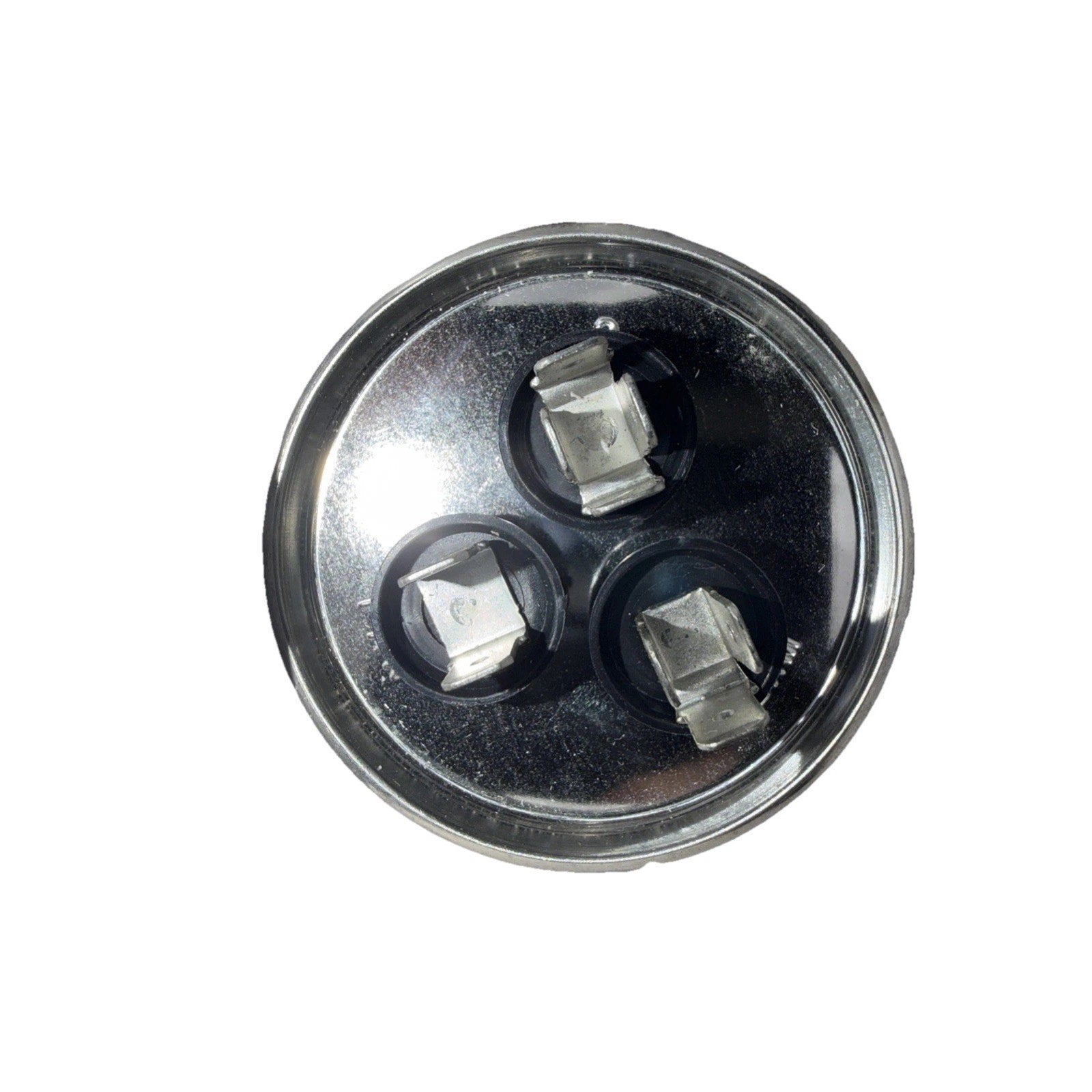 Top-down view of a round metallic electrical component with three flat metal terminals arranged in a triangular pattern on a black base against a white background.