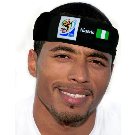Man wearing a black headband displaying the 2010 FIFA World Cup South Africa logo, the Nigerian flag, and "Nigeria" text on a white background.