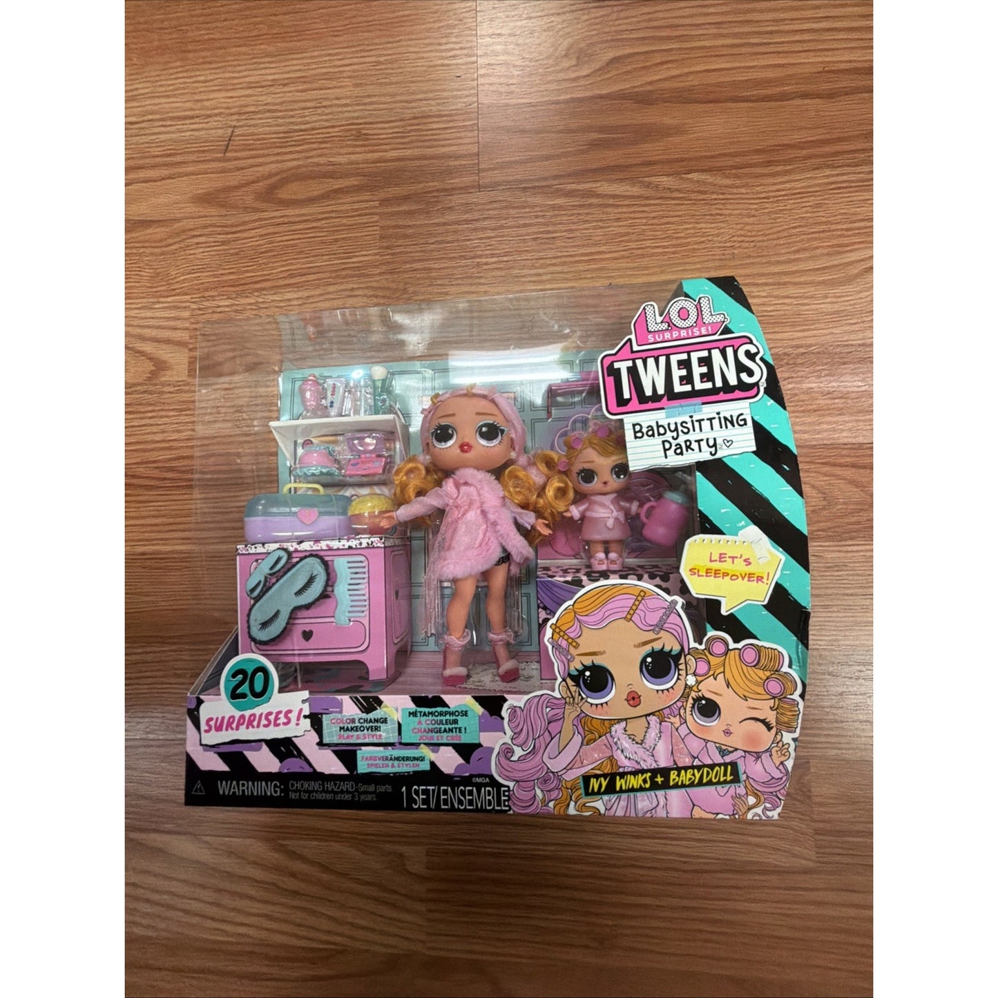 Plastic packaging containing LOL Surprise Tweens dolls with accessories, featuring a pink and blue themed babysitting party set displayed on a wooden floor background.
