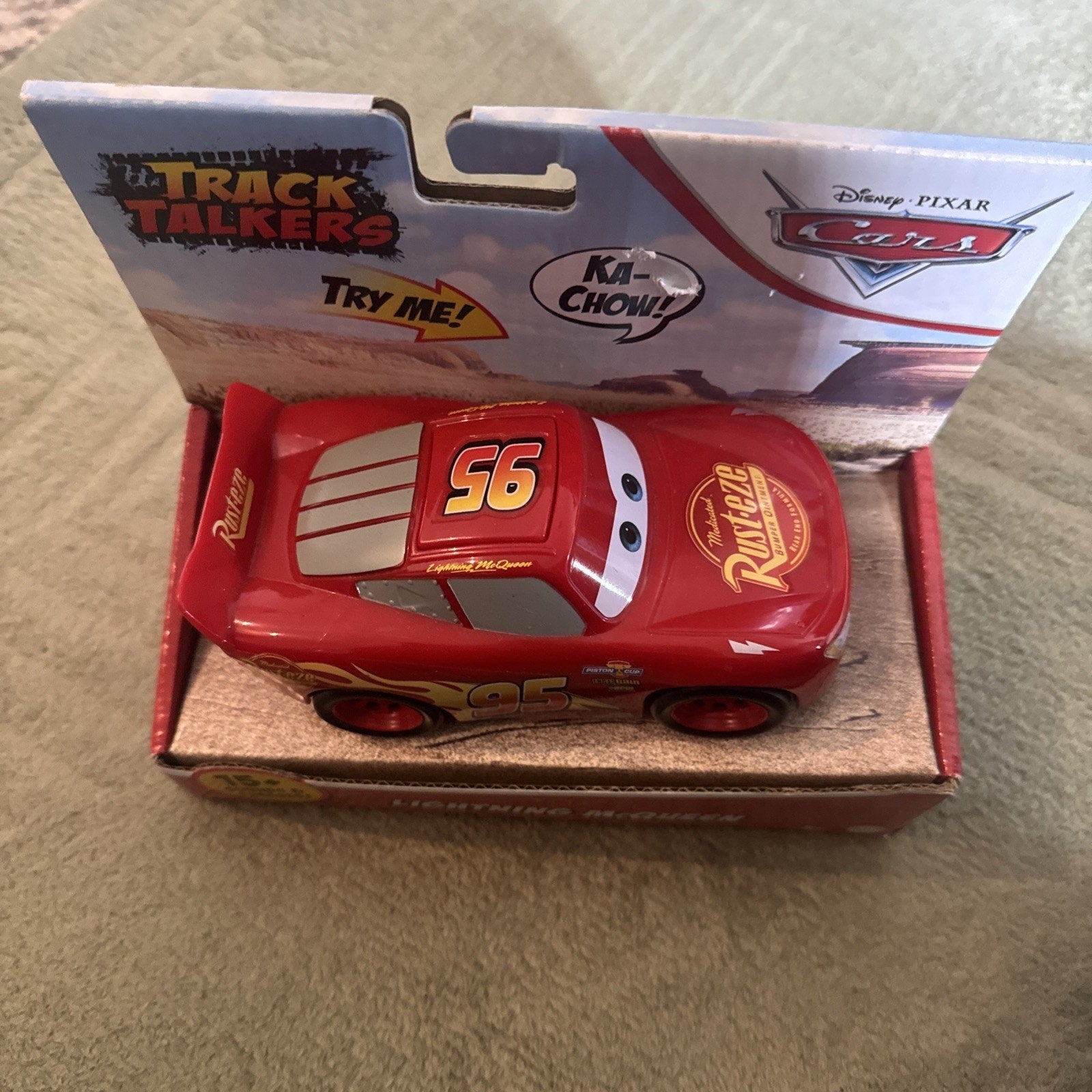 Disney Pixar Cars Track Talkers Lightning McQueen toy car with 15+ sounds and phrases in original packaging box
