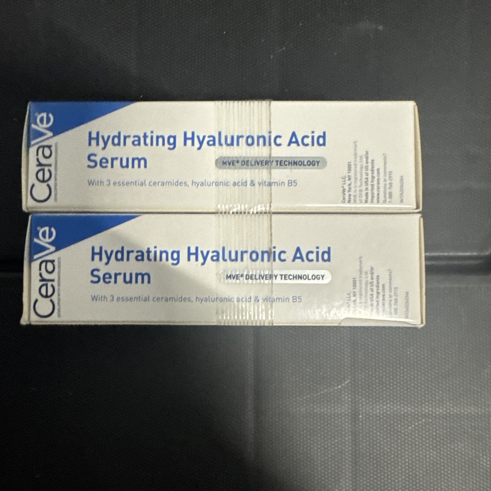 Two CeraVe Hydrating Hyaluronic Acid Serum 1 oz boxes stacked with product details and branding visible