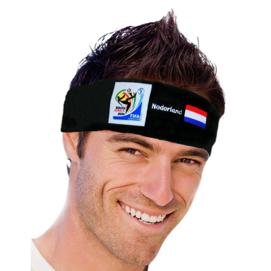 Man smiling and wearing a black headband featuring the 2010 FIFA World Cup South Africa logo, the Dutch flag, and "Nederland" text on a white background.