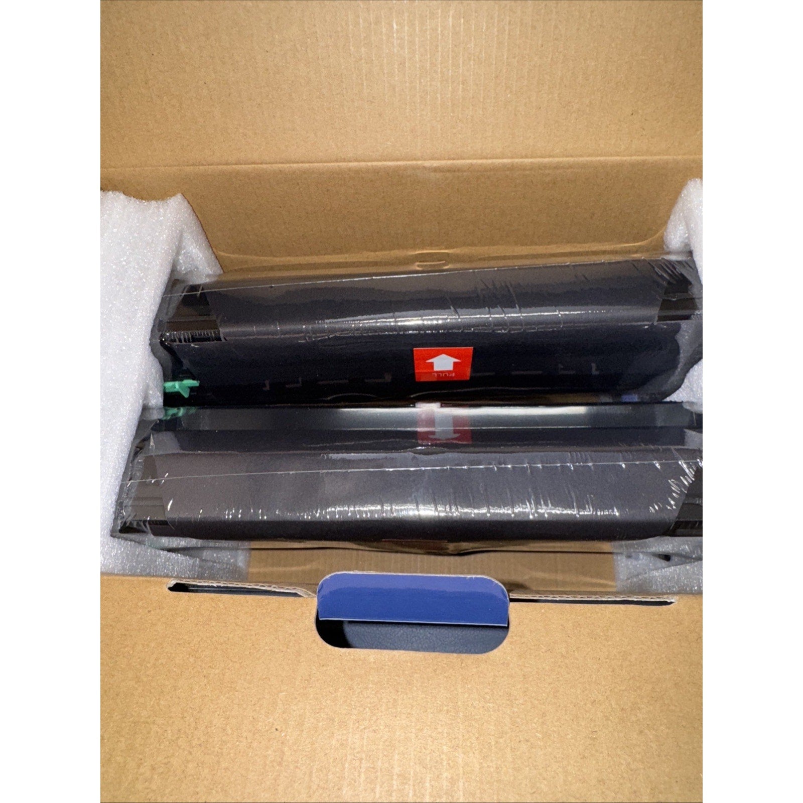 Brother DR-820 Drum Unit packaged in protective foam inside a brown cardboard box ready for shipping or storage