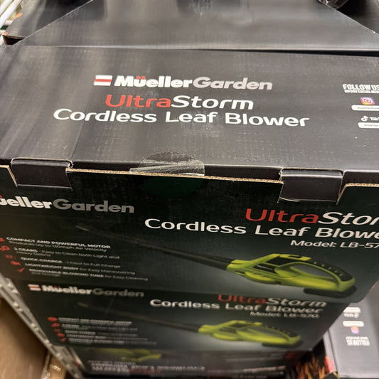 Packaging box for a MuellerGarden UltraStorm cordless leaf blower showing product name and a partial image of the green and black blower on a dark background.