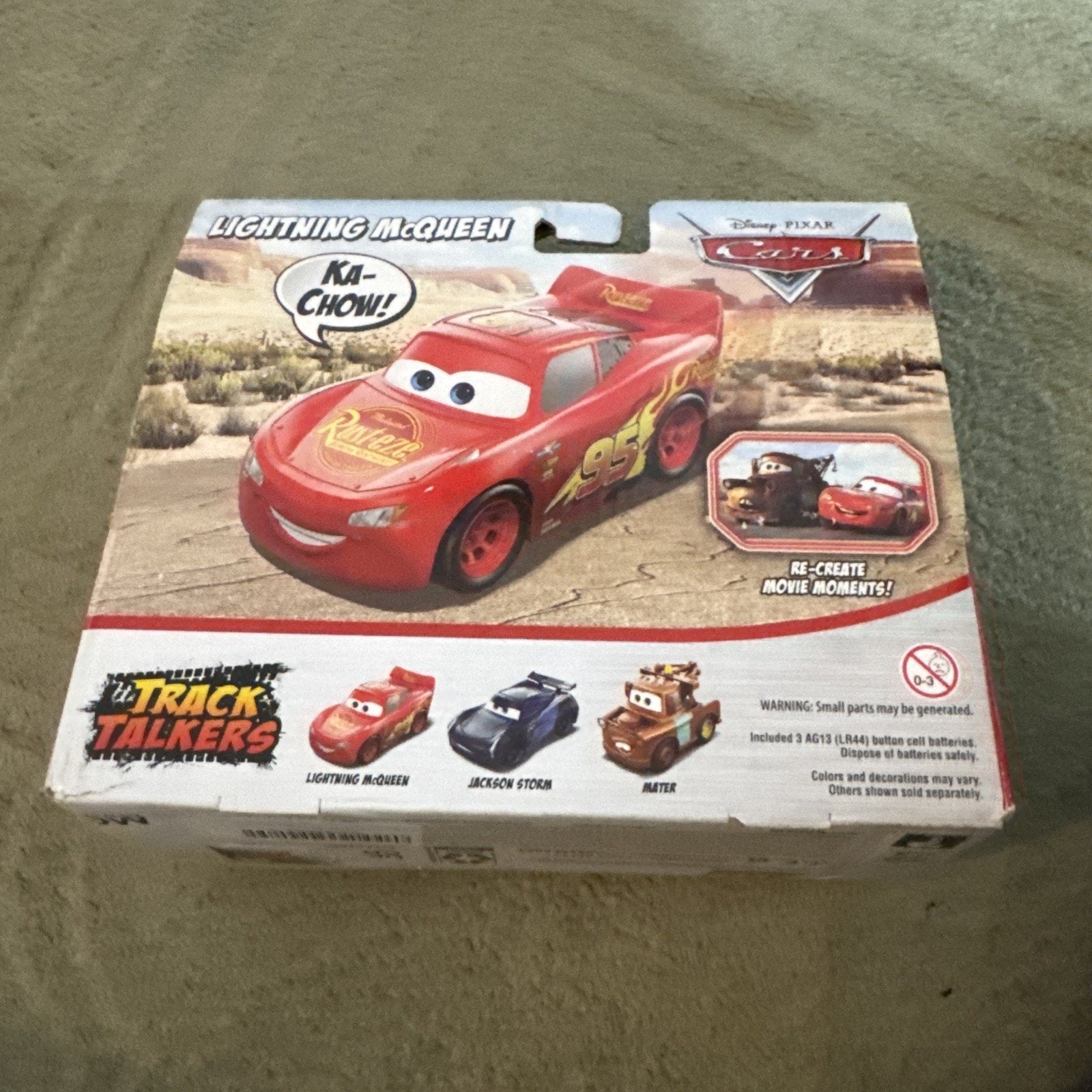 Disney Pixar Cars Track Talkers Lightning McQueen toy with 15+ sounds and phrases in branded packaging box