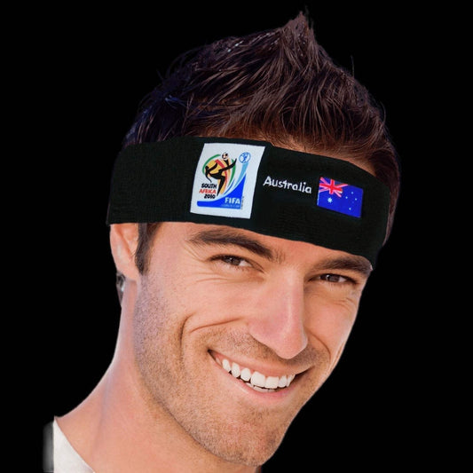 Man smiling while wearing a black sports headband featuring the 2010 FIFA World Cup South Africa logo, the word "Australia," and the Australian flag on a black background.