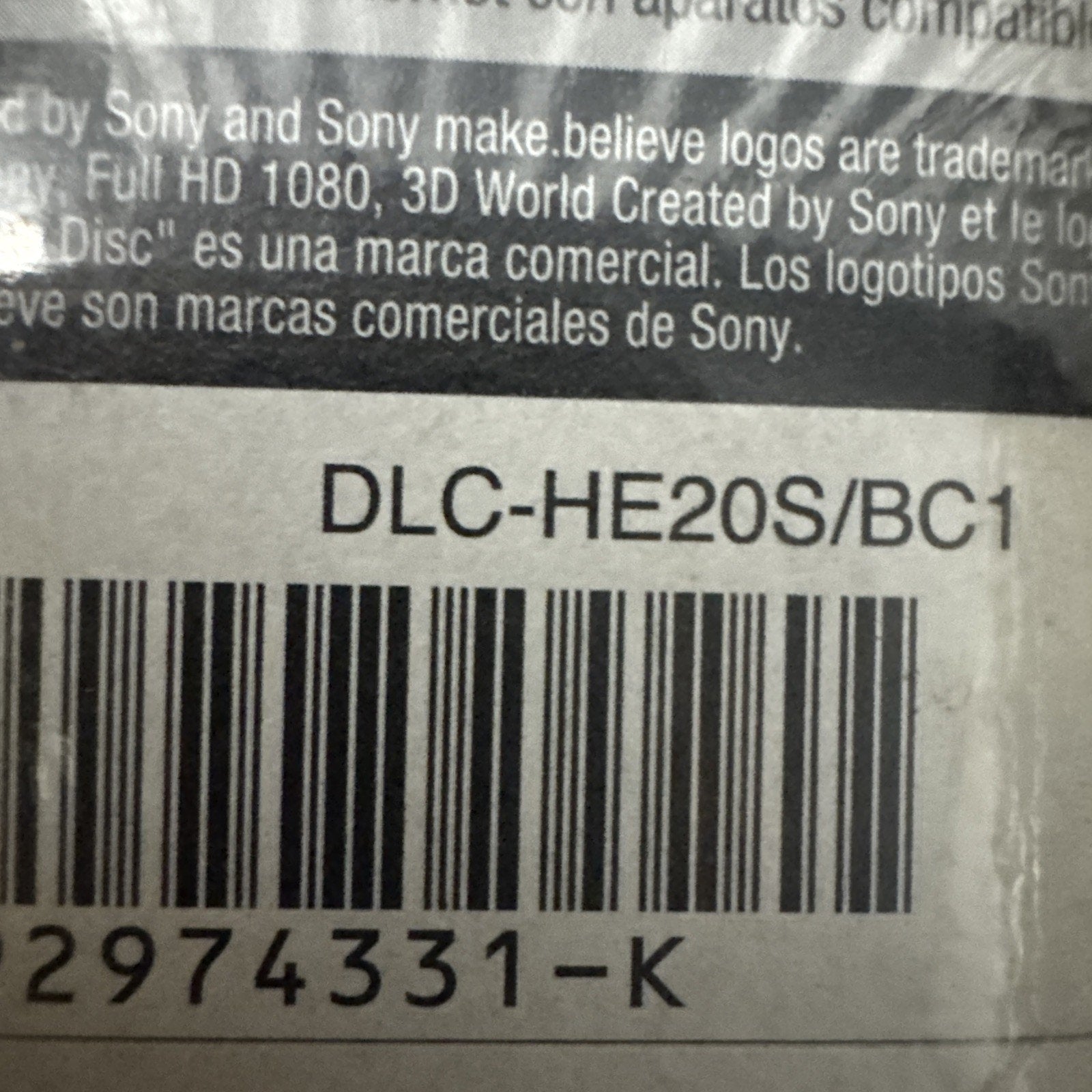 Close-up of Sony HDMI DLC-HE20S/BC1 cable packaging showing barcode and product identification code on label
