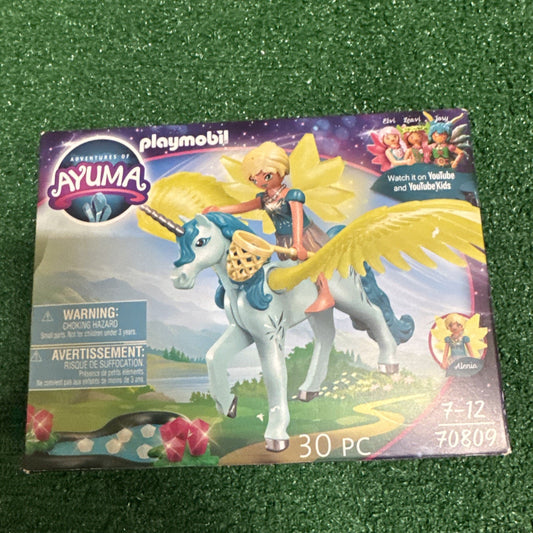 Playmobil 70809 Ayuma Crystal Fairy toy set featuring fairy figure riding a white unicorn with yellow wings and horn