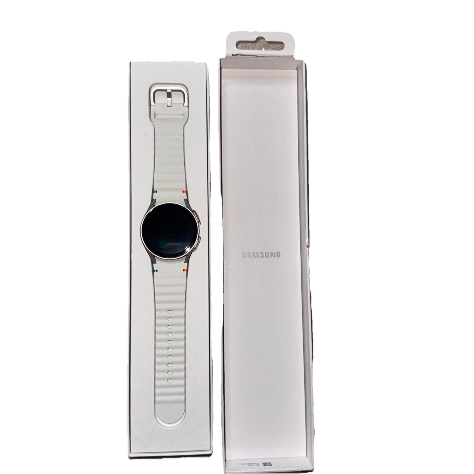 Samsung Galaxy Watch7 40mm cream smartwatch with silicone band displayed in white Samsung branded box packaging