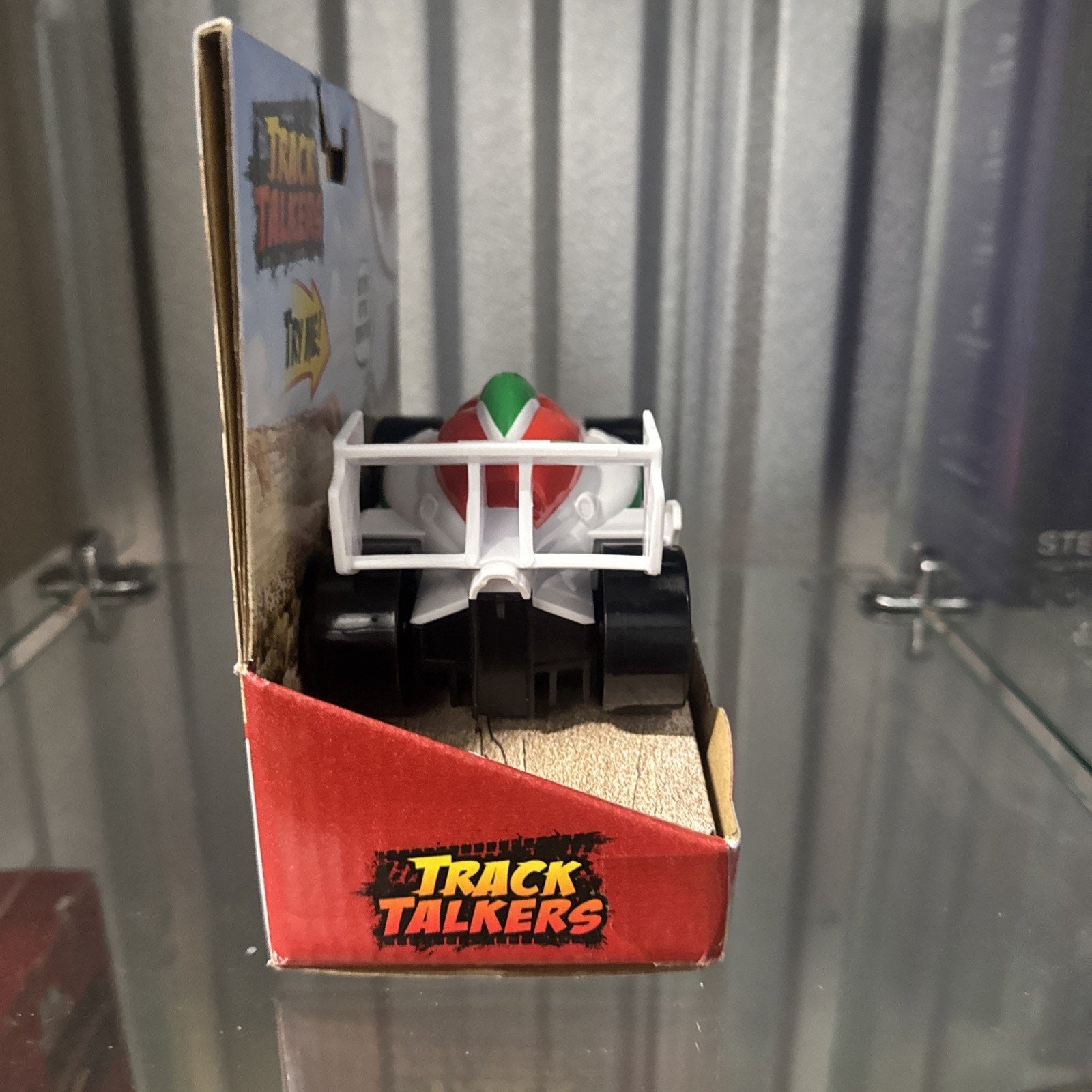Disney Pixar Cars Francesco Bernoulli Track Talkers toy car in packaging showing front with race car design and logo panel