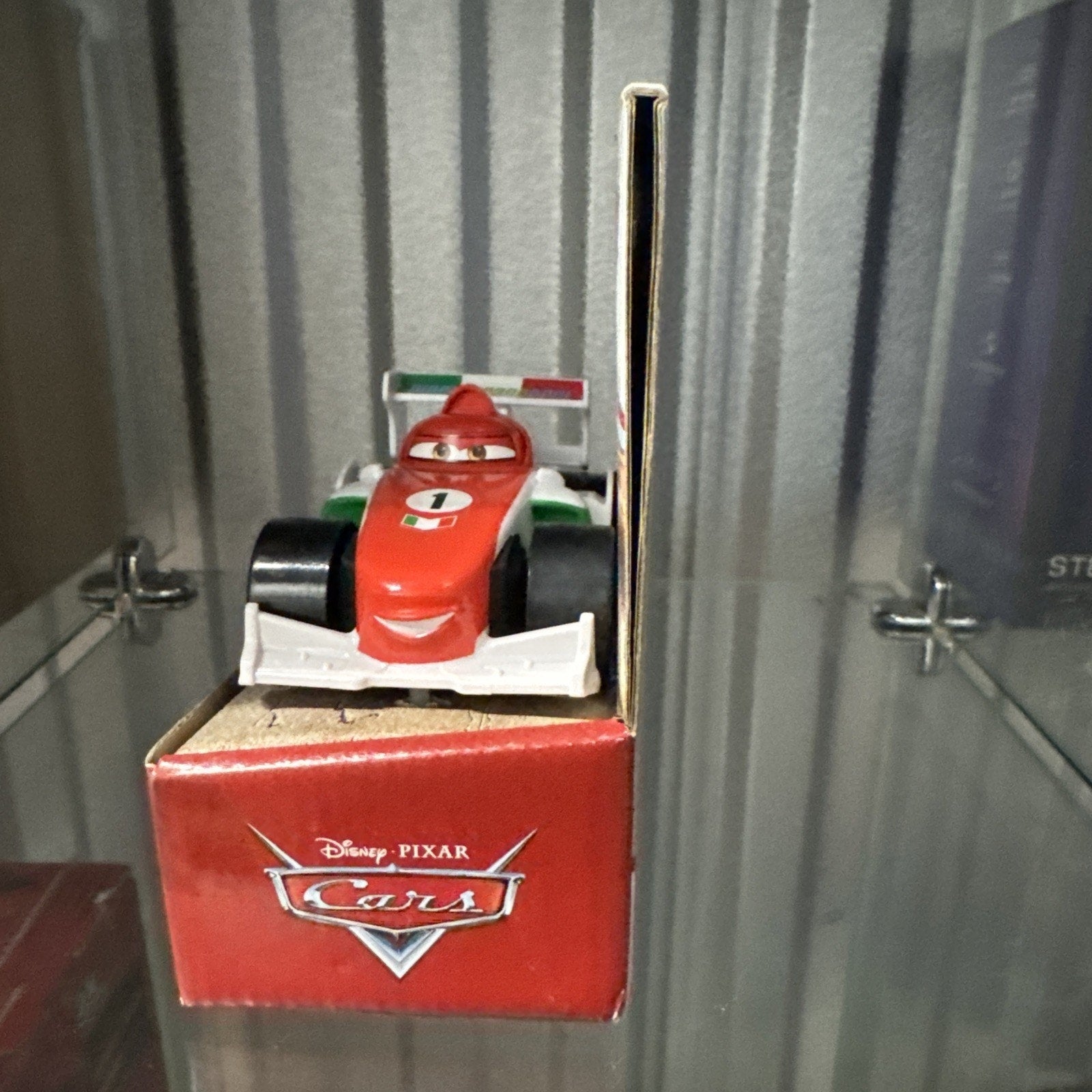 Disney Pixar Cars Francesco Bernoulli Track Talkers toy car on red packaging with logo and Italian flag colors on vehicle