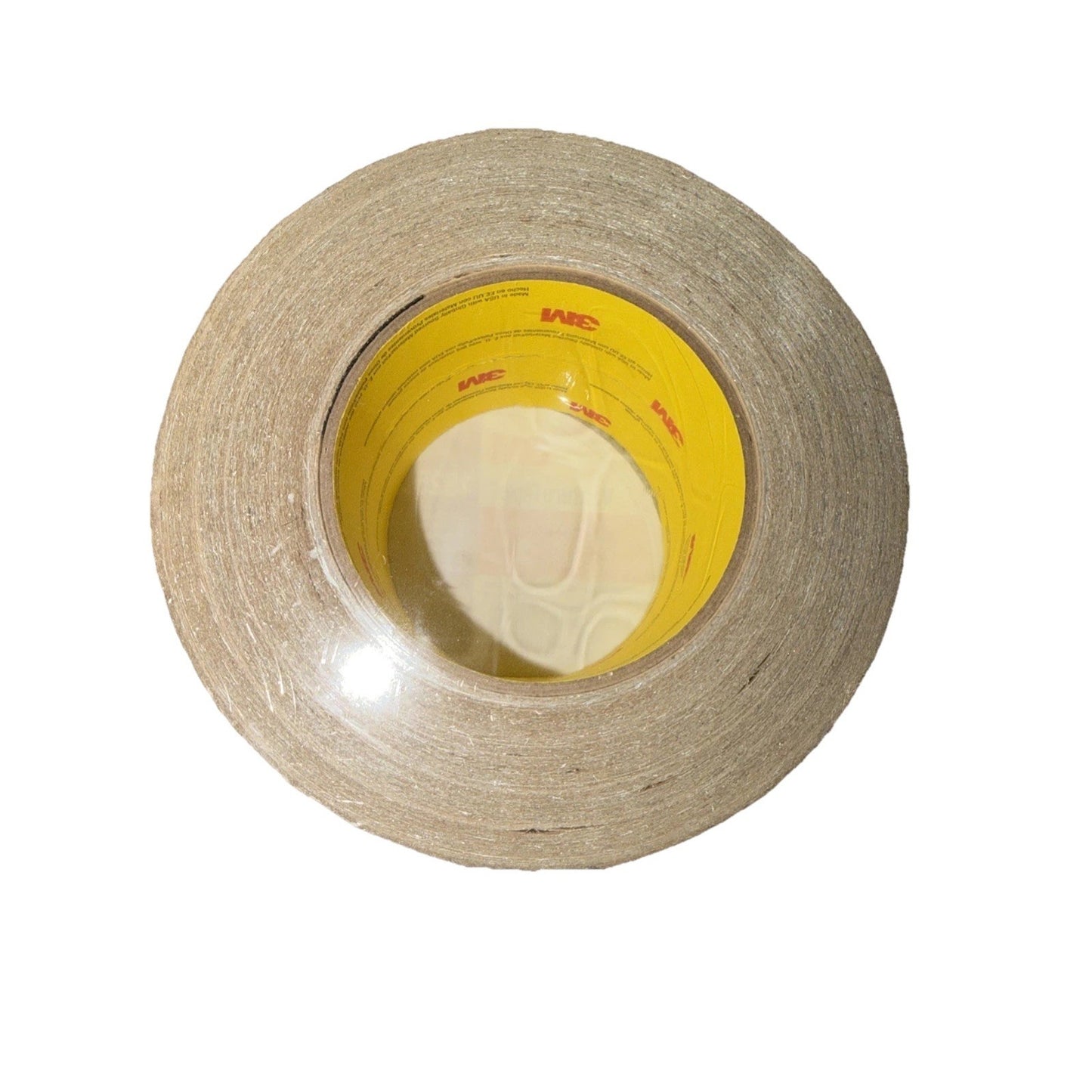 Top-down view of a large roll of natural brown adhesive tape with a yellow core featuring red branding text on a white background.
