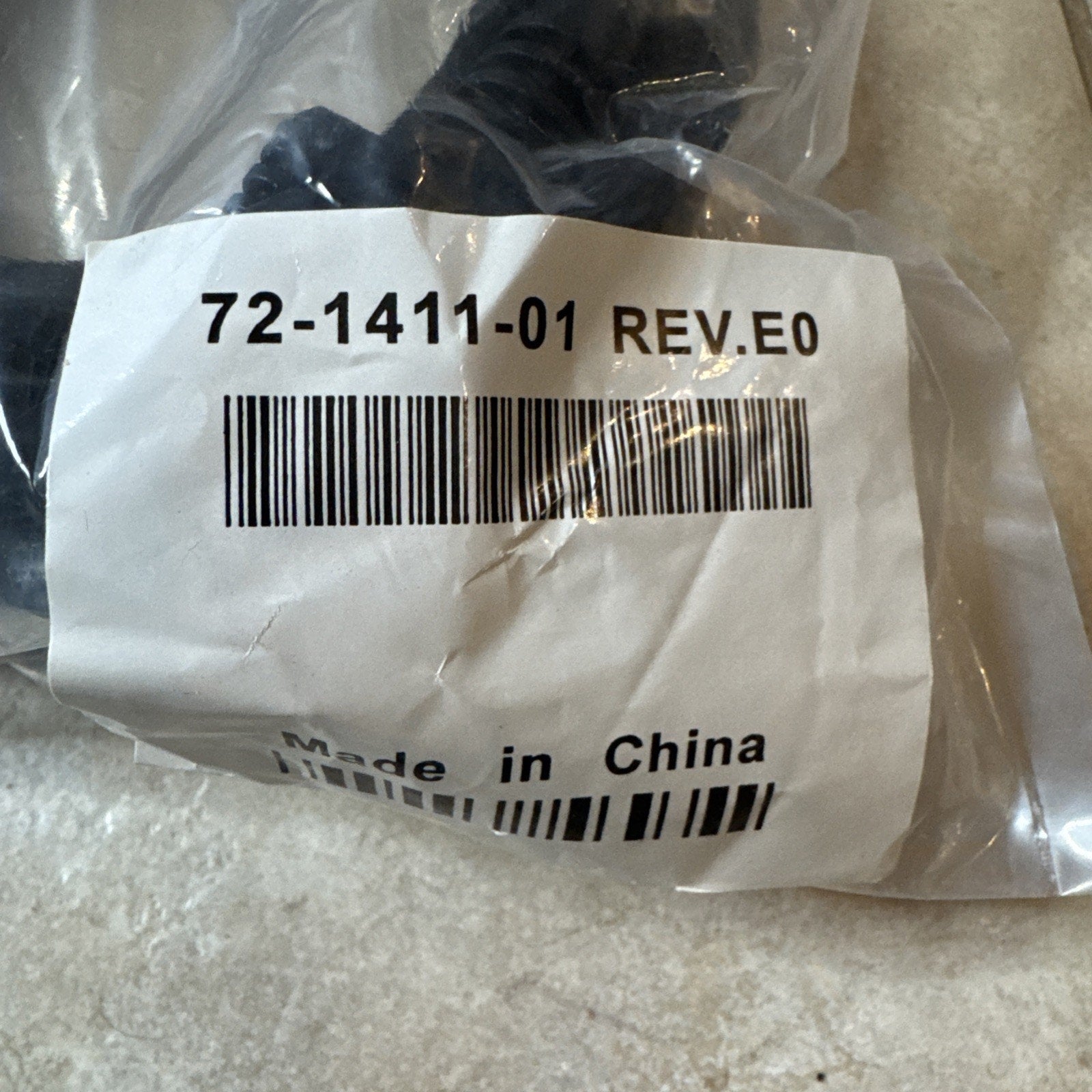 Cisco Twist Lock Power Cord Cable 72-1411-01 Rev E0 in clear plastic packaging with barcode label and Made in China text