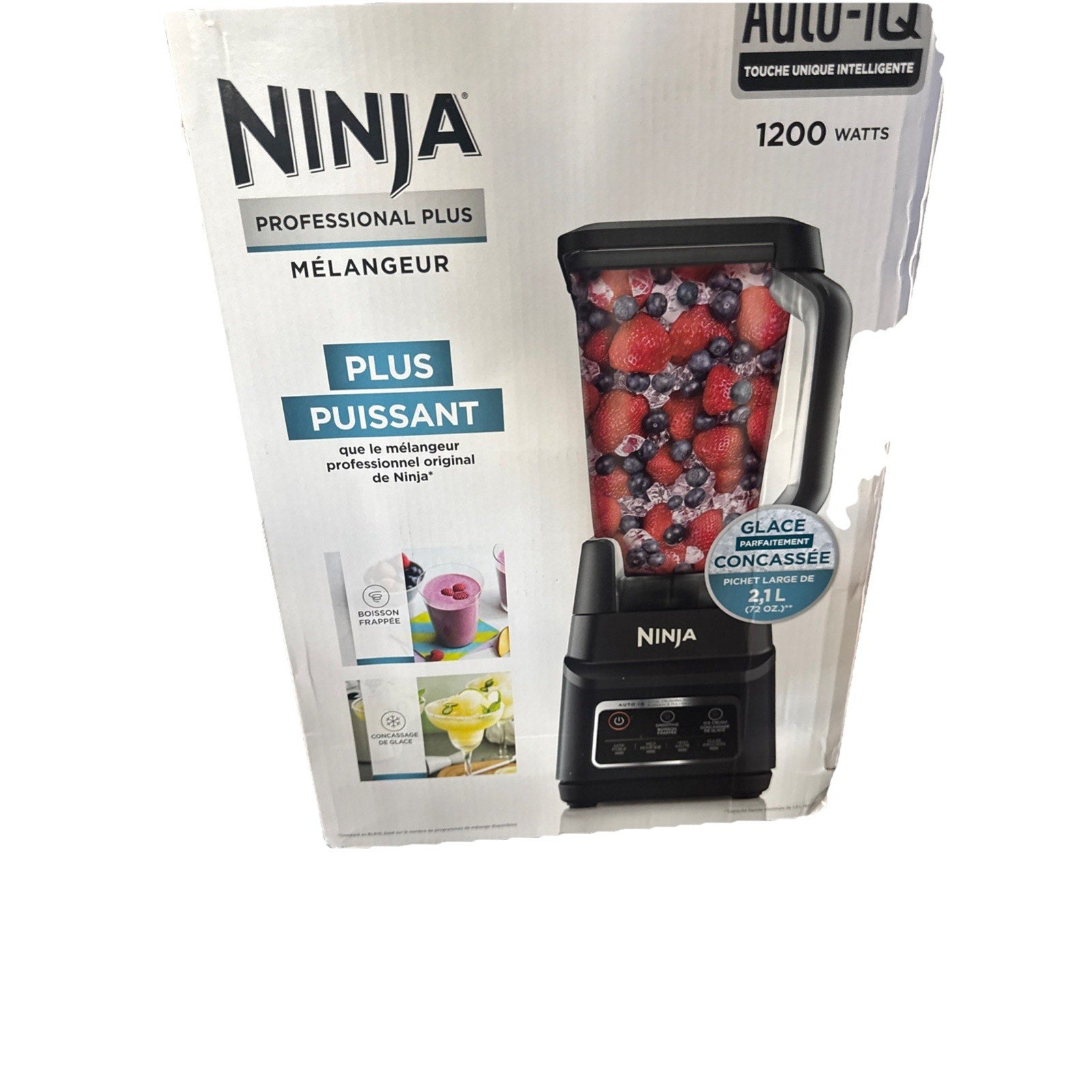 Ninja Professional Plus blender with 1200 watts and 2.1L pitcher filled with berries on packaging box