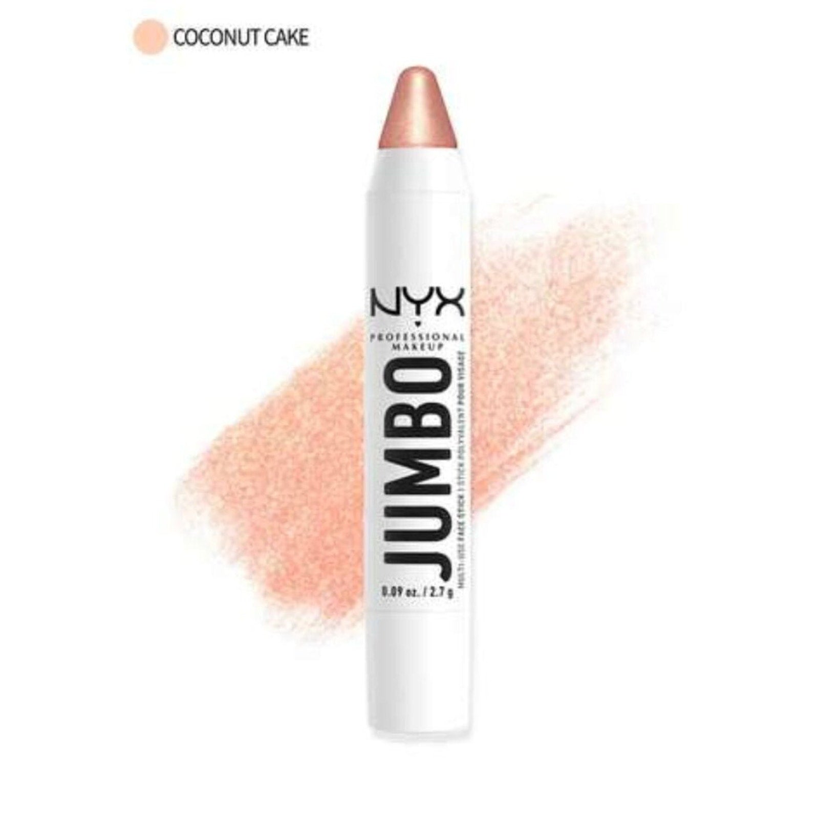 White jumbo pencil styled makeup crayon with a shimmering peachy-pink tip labeled "Coconut Cake" and a smudged swatch of the same creamy highlight color behind it.