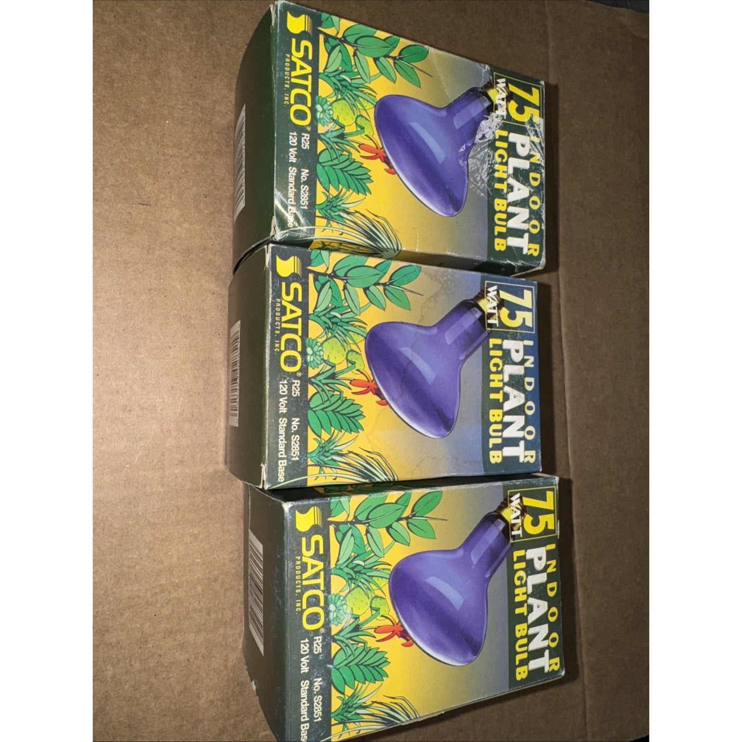 Three Satco S2851 75 watt blue R25 medium base plant light bulbs in original green and yellow packaging
