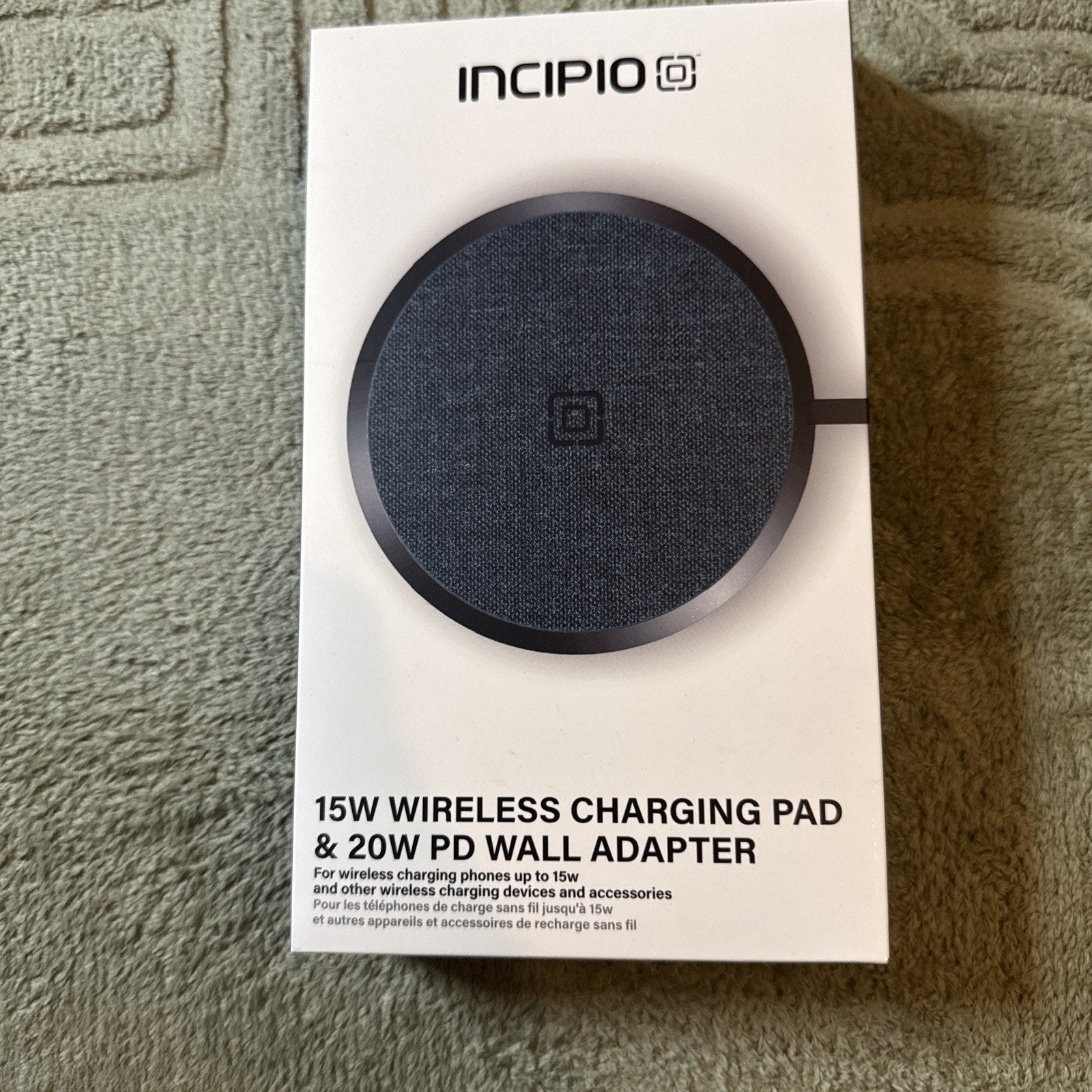 Incipio 15W wireless charging pad and 20W PD wall adapter packaged box showing product image and branding