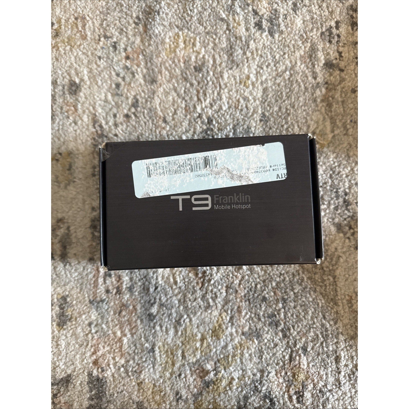 Boxed Franklin T9 Black Mobile WiFi Hotspot modem for T-Mobile 4G LTE with product label on top of box