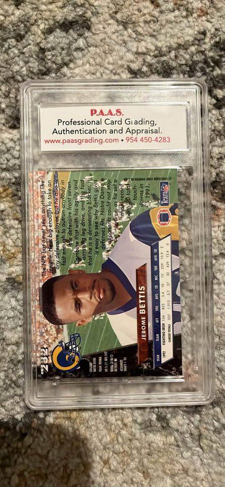Jerome Bettis Rams collectible football card graded and authenticated by P.A.A.S. in protective case.