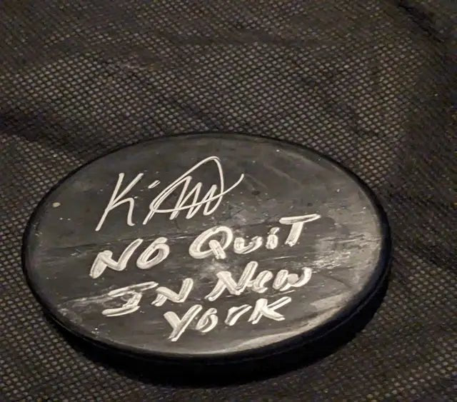 K'Andre Miller Signed Hockey Puck (COA), Sports Collectible