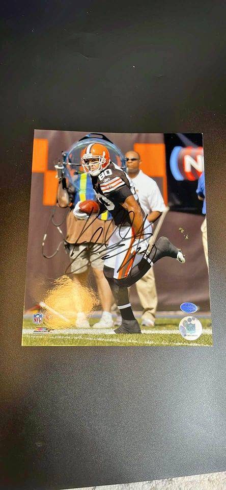 Kellen Winslow action shot running football in Cleveland Browns uniform with autograph and certificate of authenticity