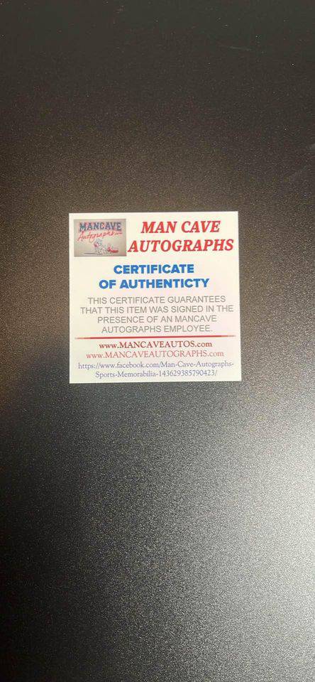 Certificate of Authenticity from Man Cave Autographs guaranteeing item signed by an autographs employee