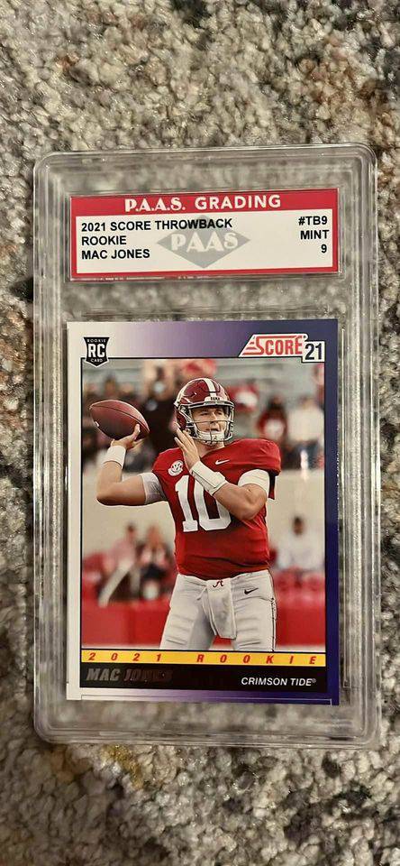 2021 Mac Jones rookie card graded Mint 9 by PAAS showing Alabama Crimson Tide quarterback in action