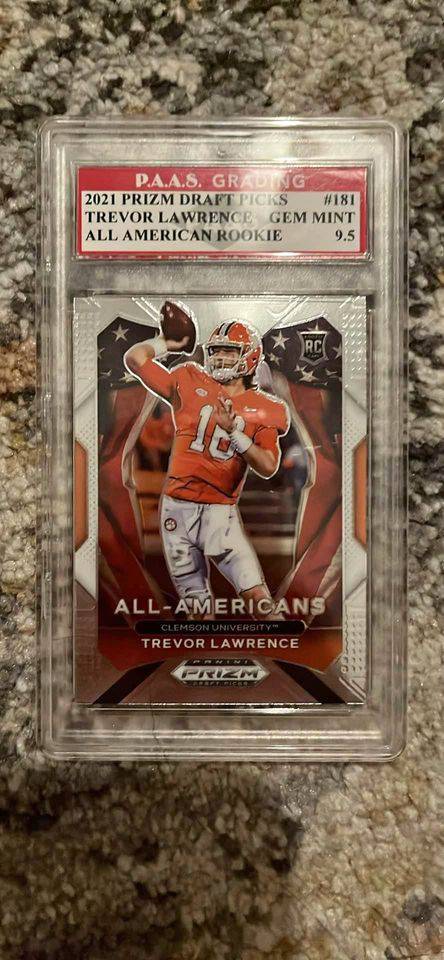 2021 Trevor Lawrence Prizm Draft Picks card graded Gem Mint 9.5 with All American Rookie label in protective case